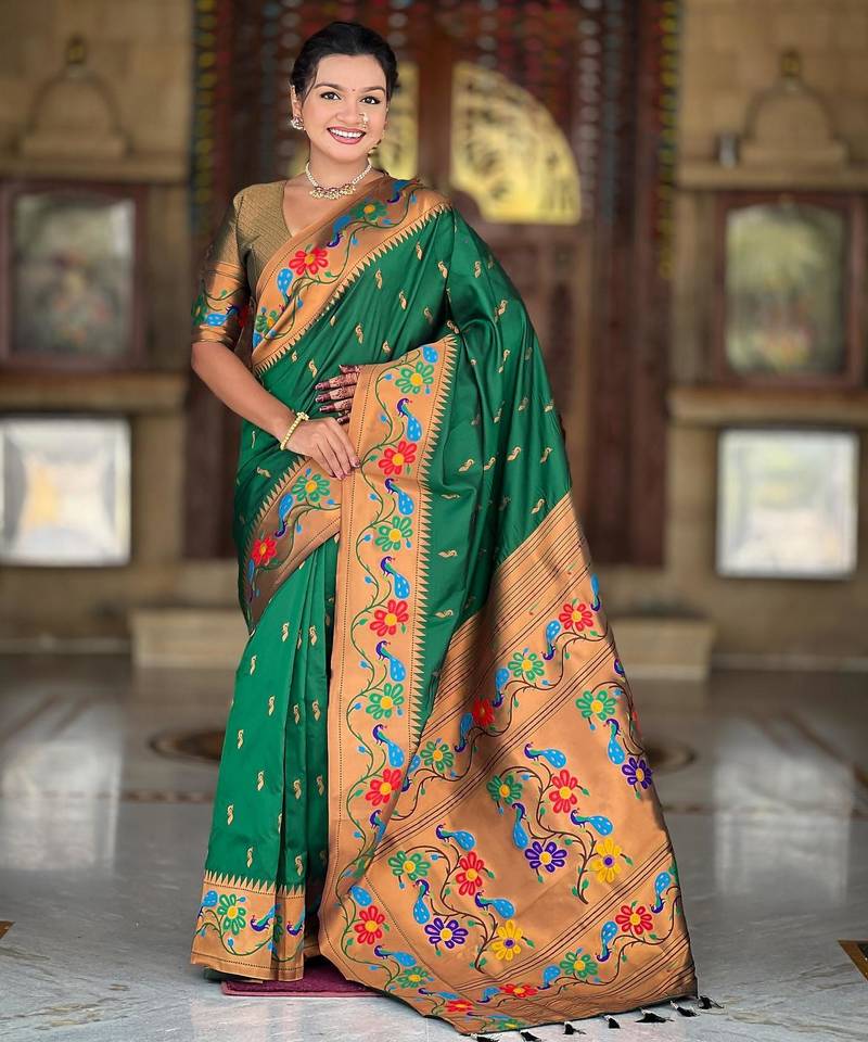 Green elegant art silk woven saree with rich zari border