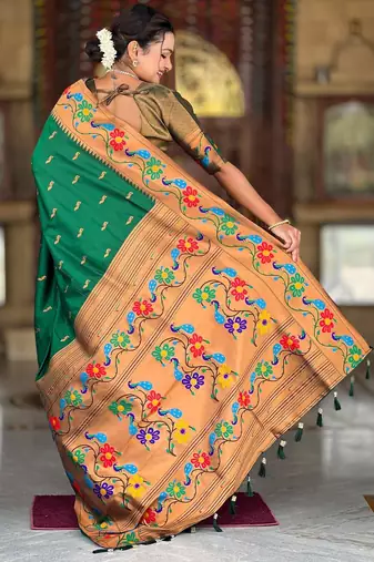Green elegant art silk woven saree with rich zari border