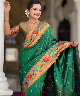 Green elegant art silk woven saree with rich zari border 3