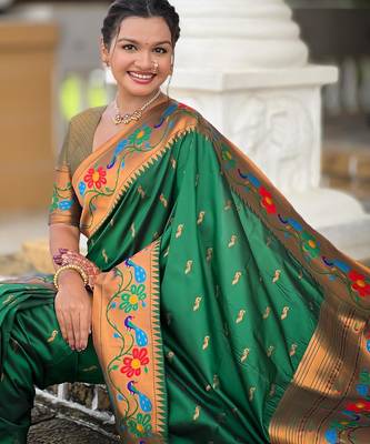 Green elegant art silk woven saree with rich zari border 5