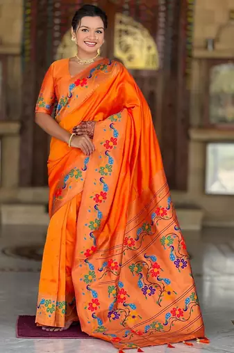Orange elegant art silk woven saree with rich zari border