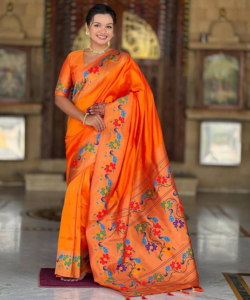 Orange elegant art silk woven saree with rich zari border