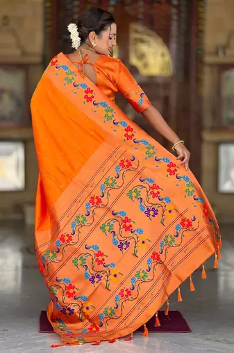 Orange elegant art silk woven saree with rich zari border