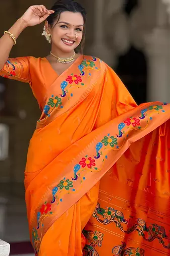 Orange elegant art silk woven saree with rich zari border