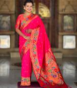 Pink elegant art silk woven saree with rich zari border