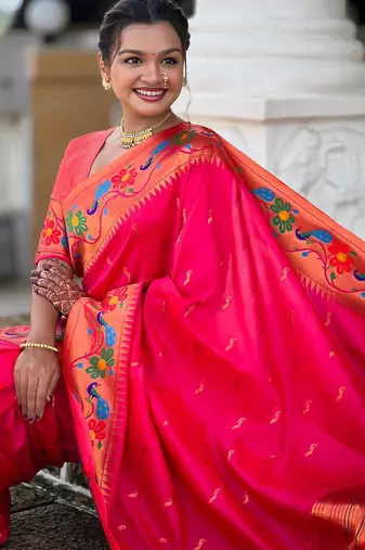 Pink elegant art silk woven saree with rich zari border
