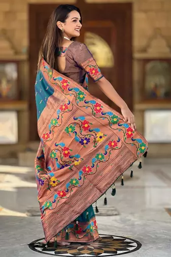 Teal elegant art silk woven saree with rich zari border