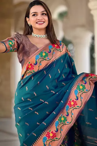 Teal elegant art silk woven saree with rich zari border