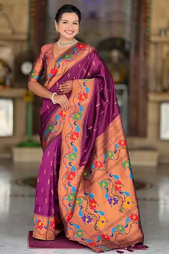 Wine elegant art silk woven saree with rich zari border