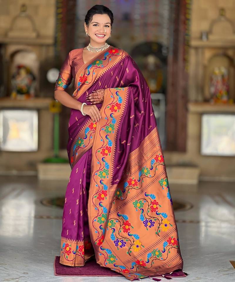 Wine elegant art silk woven saree with rich zari border