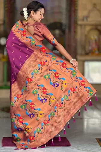 Wine elegant art silk woven saree with rich zari border