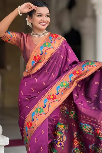 Wine elegant art silk woven saree with rich zari border