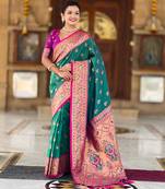 Rama green elegant art silk woven saree with rich zari border