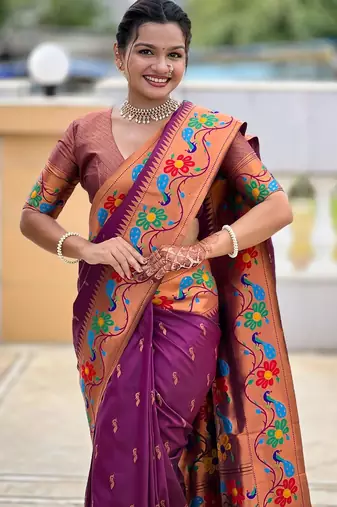 Wine elegant art silk woven saree with rich zari border