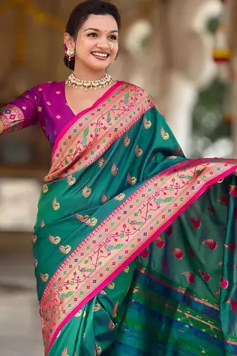 Rama green elegant art silk woven saree with rich zari border
