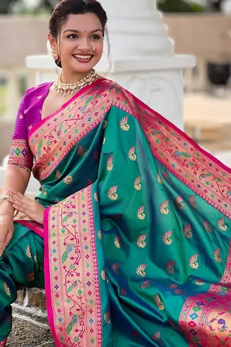 Rama green elegant art silk woven saree with rich zari border