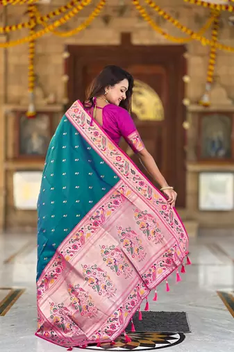 Rama green elegant art silk woven saree with rich zari border