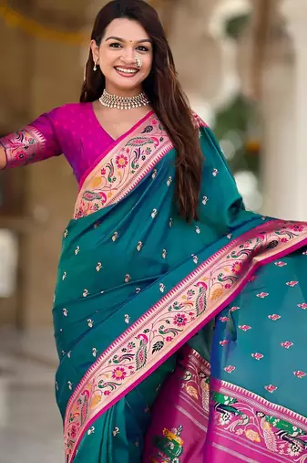 Rama green elegant art silk woven saree with rich zari border