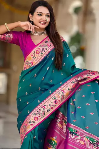 Rama green elegant art silk woven saree with rich zari border