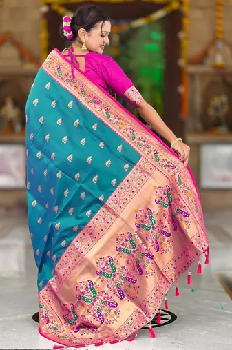 Rama green elegant art silk woven saree with rich zari border