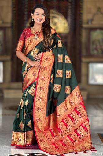 Green elegant art silk woven saree with rich zari border