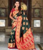 Green elegant art silk woven saree with rich zari border