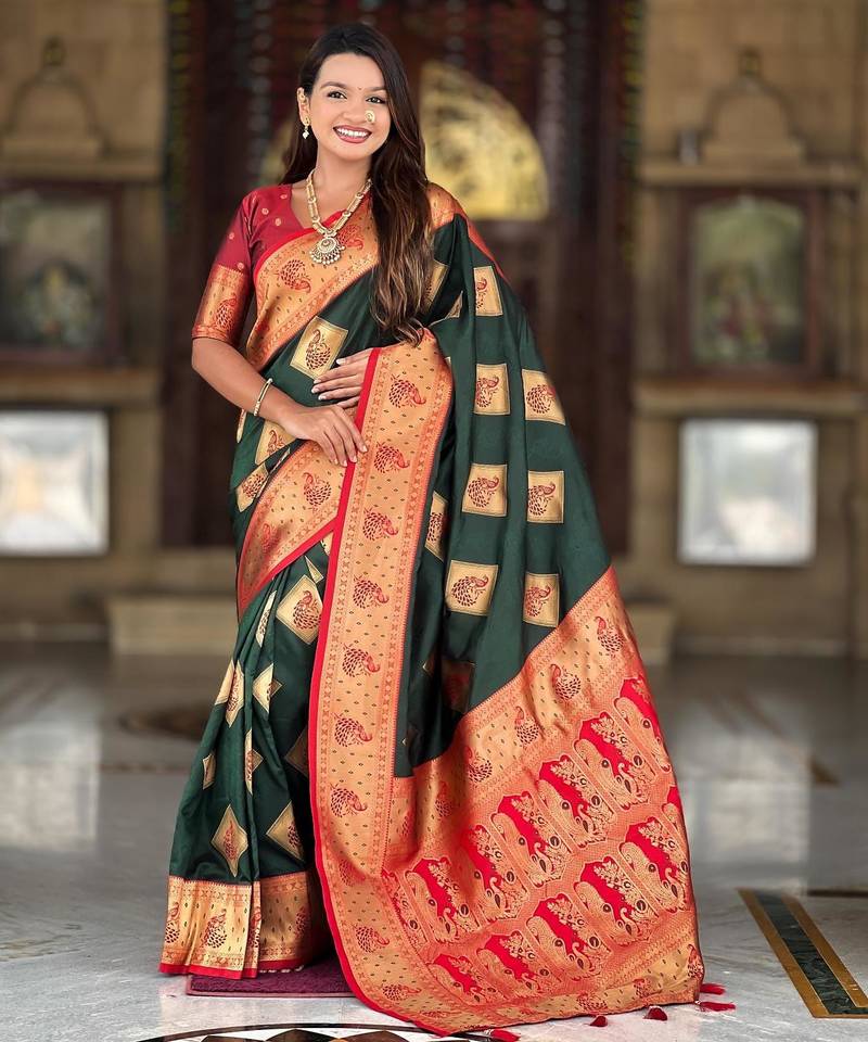 Green elegant art silk woven saree with rich zari border
