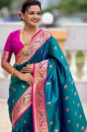 Rama green elegant art silk woven saree with rich zari border