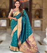 Rama green elegant art silk woven saree with rich zari border