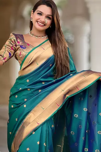 Rama green elegant art silk woven saree with rich zari border