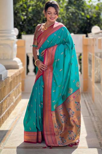 Rama green elegant art silk woven saree with rich zari border
