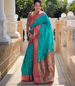 Rama green elegant art silk woven saree with rich zari border