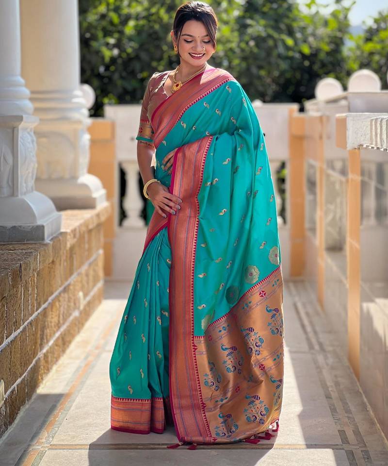Rama green elegant art silk woven saree with rich zari border