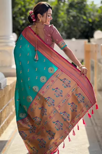 Rama green elegant art silk woven saree with rich zari border