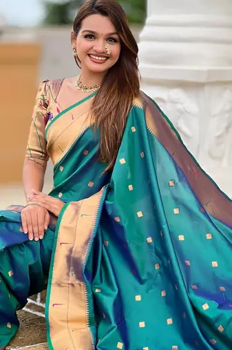 Rama green elegant art silk woven saree with rich zari border