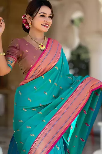 Rama green elegant art silk woven saree with rich zari border