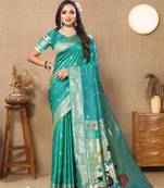 Rama green elegant art silk woven saree with rich zari border