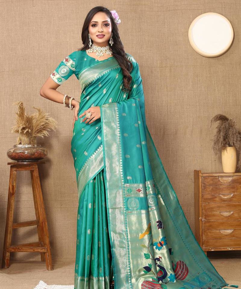 Rama green elegant art silk woven saree with rich zari border