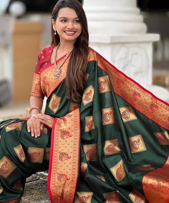 Green elegant art silk woven saree with rich zari border 5