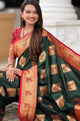 Green elegant art silk woven saree with rich zari border