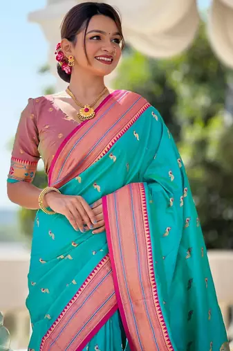 Rama green elegant art silk woven saree with rich zari border