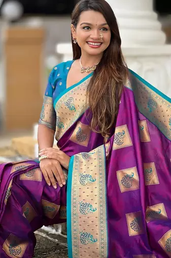 violet elegant art silk woven saree with rich zari border