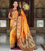 Mustard elegant art silk woven saree with rich zari border