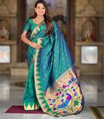 Rama green elegant art silk woven saree with rich zari border