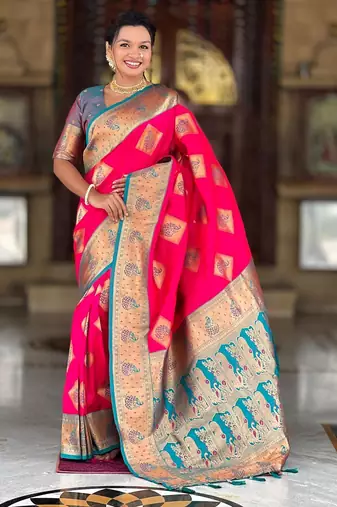 Pink elegant art silk woven saree with rich zari border