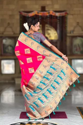 Pink elegant art silk woven saree with rich zari border