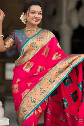 Pink elegant art silk woven saree with rich zari border