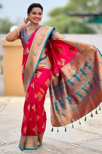 Pink elegant art silk woven saree with rich zari border