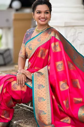 Pink elegant art silk woven saree with rich zari border