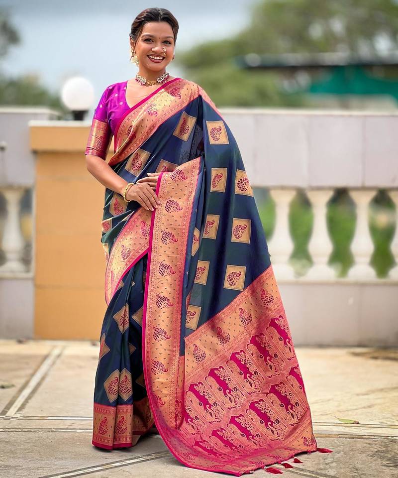 Teal elegant art silk woven saree with rich zari border
